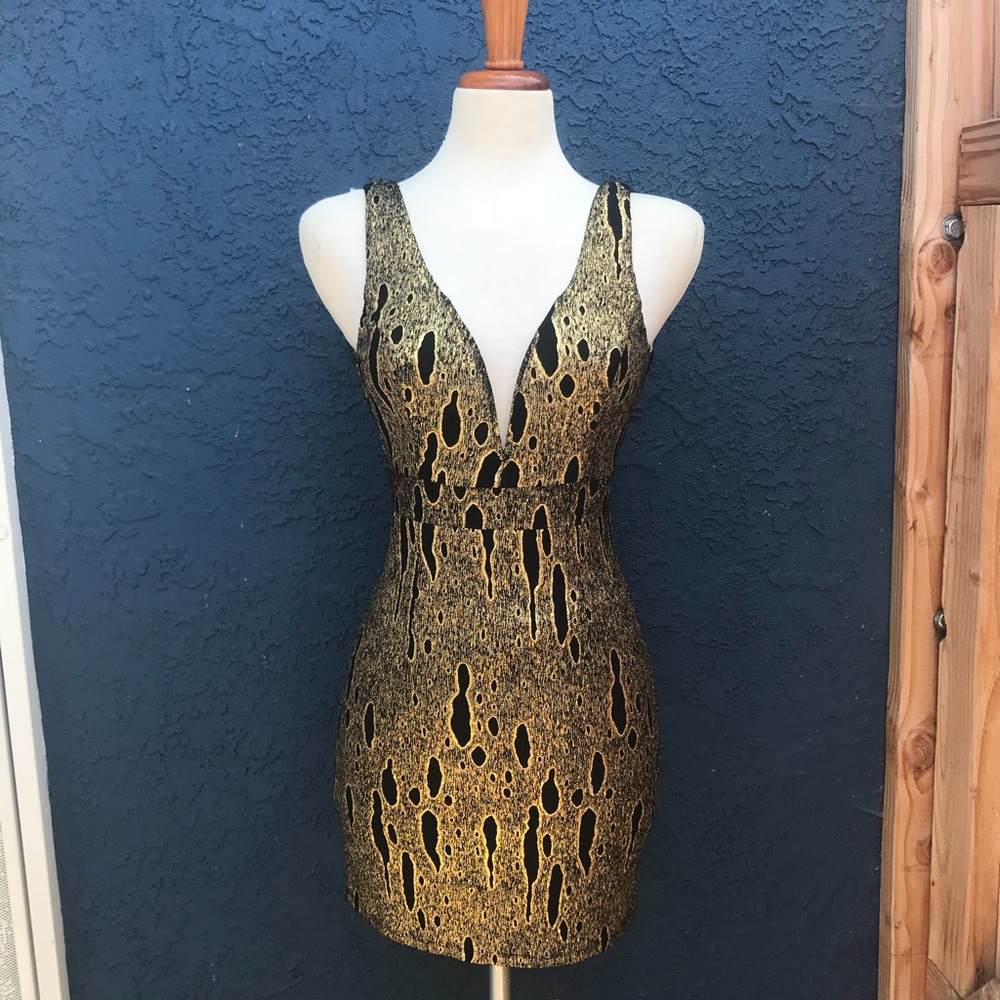 Gold dress with black detail